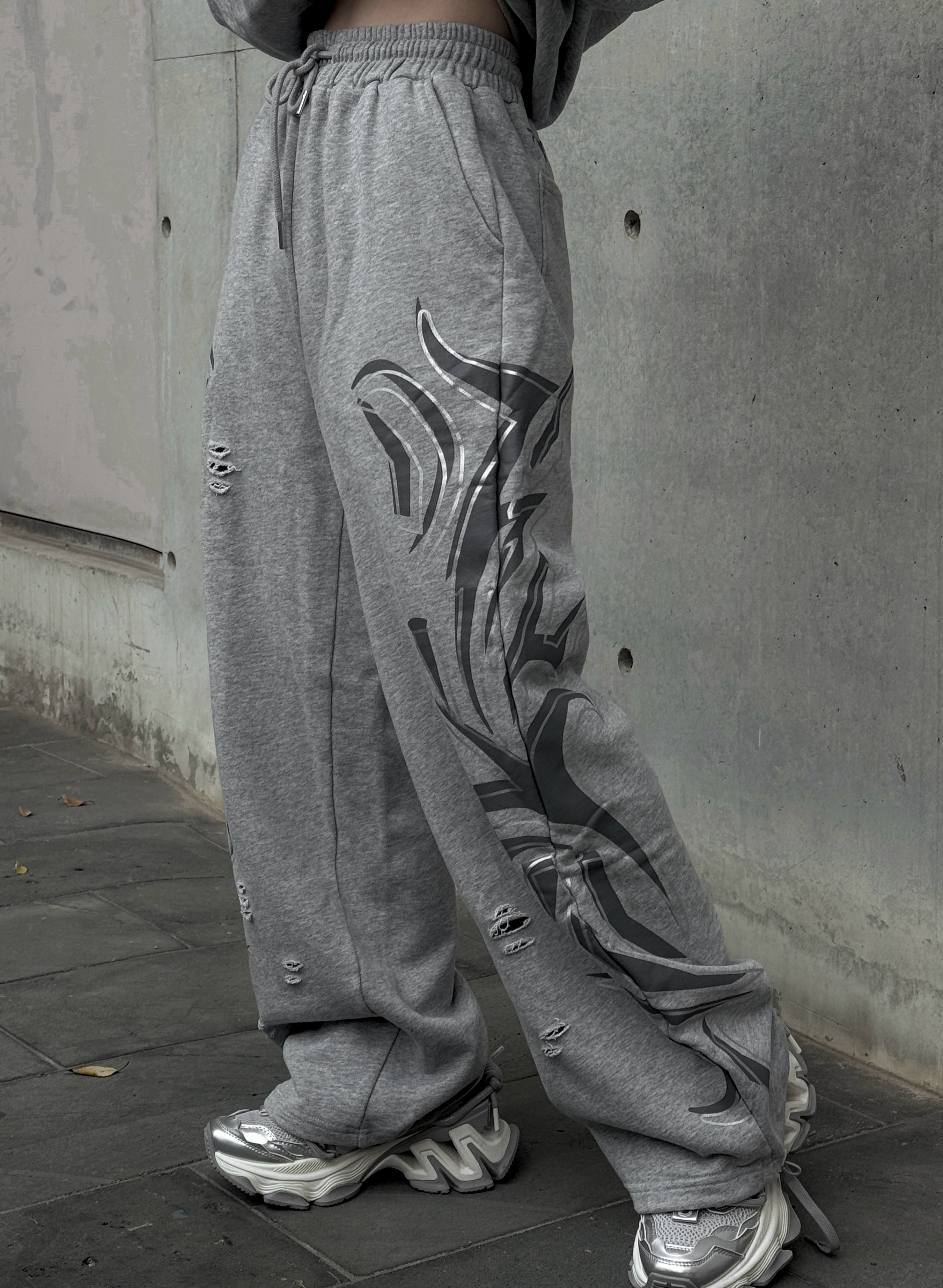 トライバルダメージスウェットパンツ KSG19367